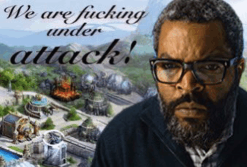 Will from the horrible War of the Worlds movie photoshopped over a fake game ad that read 'We are fucking under attack!' over a burning fantasy city.