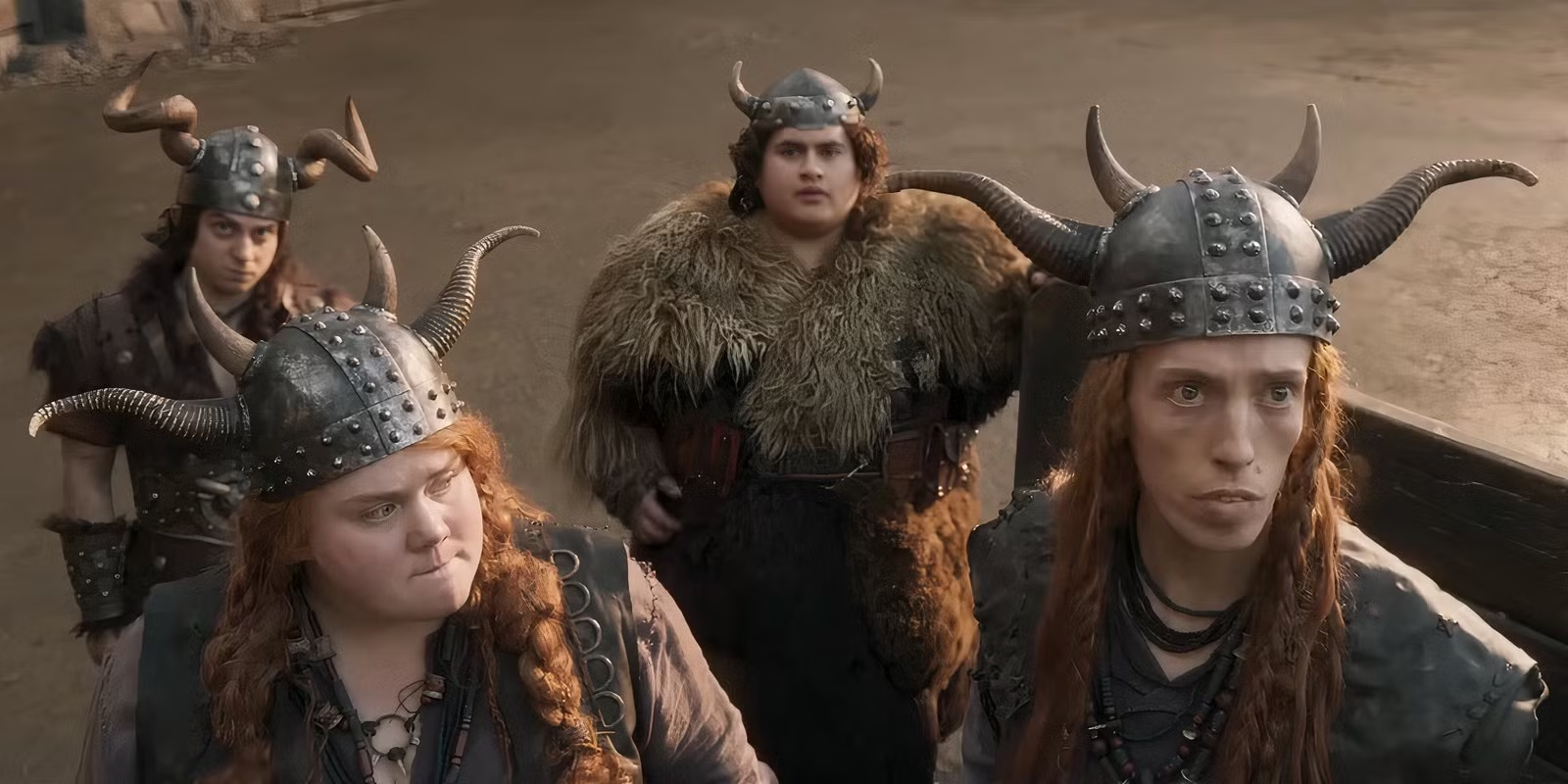 A shot of Ruffnut, Tuffnut, Fishlegs, and Toothless in the live-action.