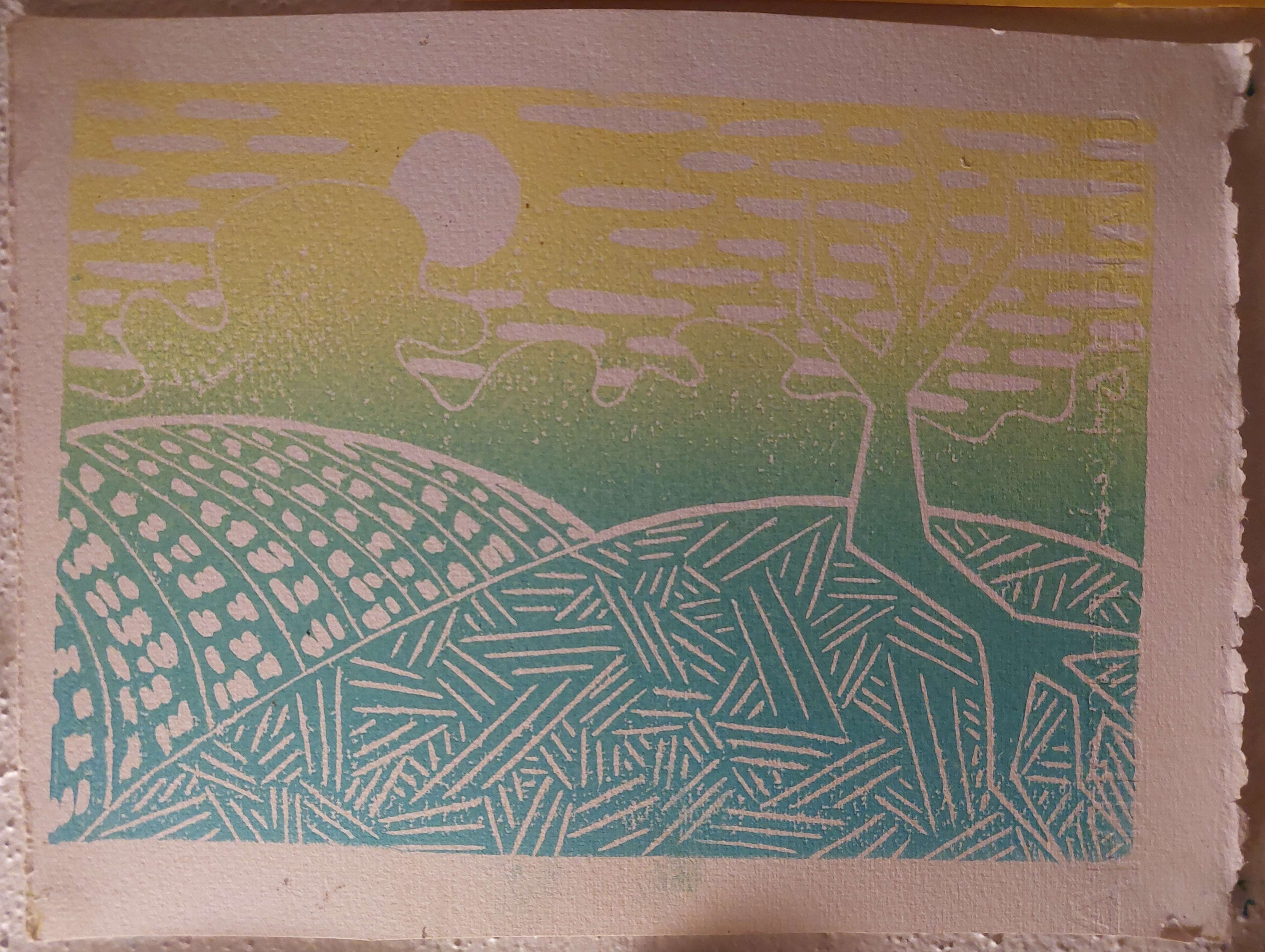 a linoblock print of a sun in the sky over two rolling hills, casting shadows of a barren tree. printed in a yellow-blue gradient, it gives the impression of sun rising into a bright day