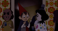 Wirt talking to Sara at a house party. He's awkwardly explaining something to her, and she's listening with interest.