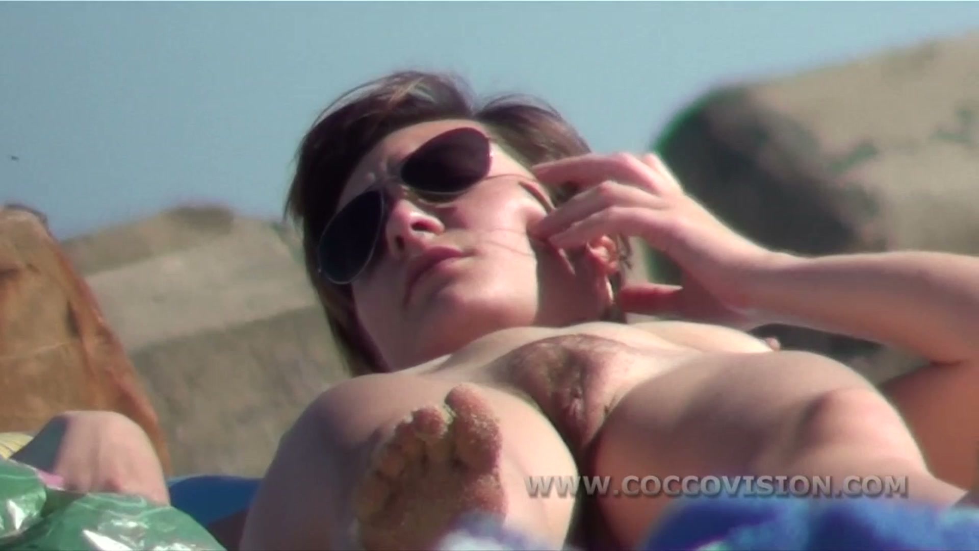 Sensual exchanges between sunbathers