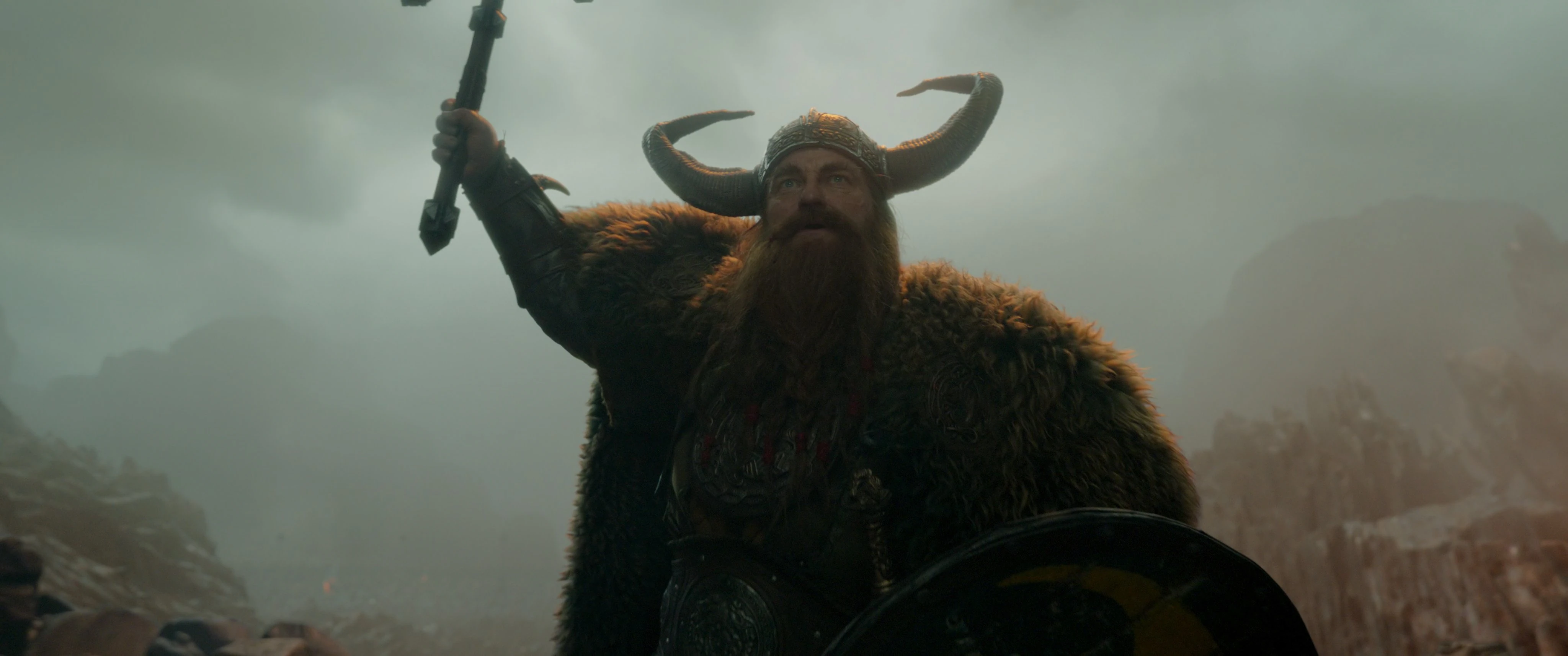 Stoick from the live-action holding up his axe.