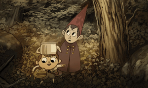 An illustration of Wirt and Greg in a forest during the day, knee-deep in foliage. Greg is pointing ahead while talking to his frog, and Wirt is glancing worriedly over his shoulder.