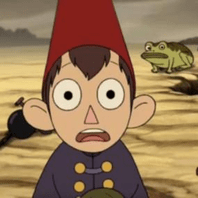 Wirt in a field with his jaw dropped and eyes wide, looking shocked.